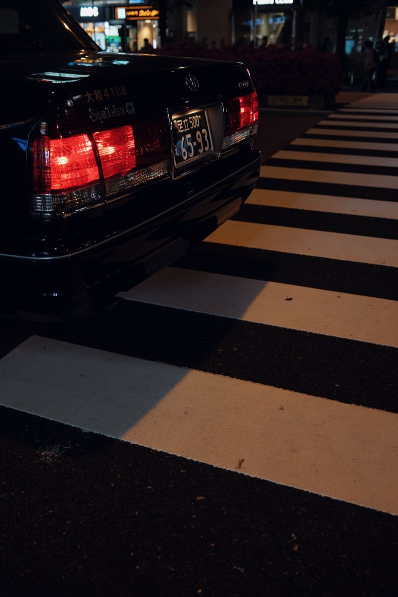 The tail lights of a car in Tokyo, Japan