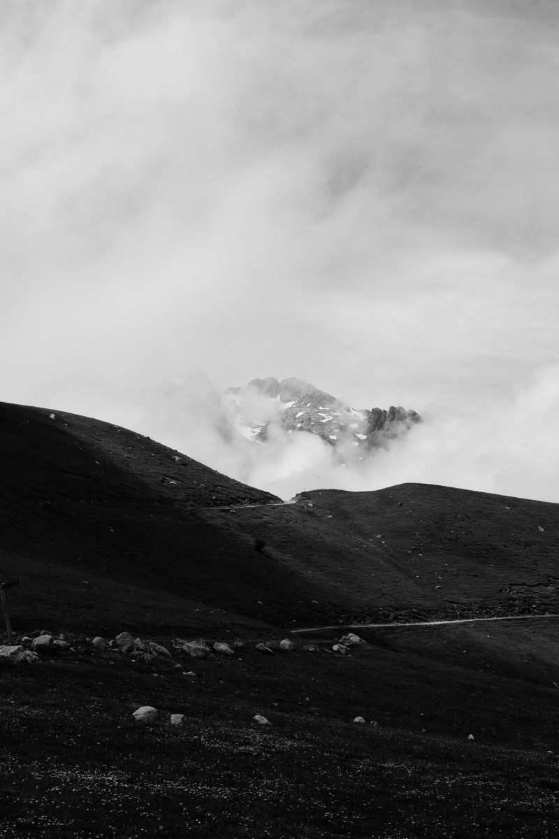 A black and white photo of the mountains in Picos de Europa, Spain